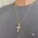 Pingente Cruz Vazada Lisa Folheado a Ouro 18k