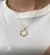Gargantilha Com Pedra e Estrelas Vazadas Folheada a Ouro 18k
