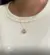 Gargantilha Redonda Cravejada de Zircônia Folheada a Ouro 18k