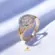 Anel Redondo Cravejado de Pedras e Cristais Folheado a Ouro 18K