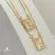 Escapulário Cruz Espírito Santo Com Zircônia Folheado a Ouro 18k