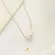 Gargantilha Pérola Shell Folheada a Ouro 18k