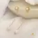 Brinco Pérola  Fio Longo Folheado a Ouro 18k