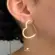 Brinco Coração Liso Folheado a Ouro 18k