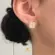 Conjunto Trevo Cravejado de Zircônia Folheado a Ouro 18k