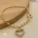 Pulseira Elo Português 4mm Coração Vazado Zircônia Folheado a Ouro 18k