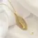 Pingente Nsa Sra de Fátima Com Pedras de Zircônia Folheada a Ouro 18k