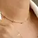 Gargantilha Choker Cravejada Ponto de Luz Coração Folheada a Ouro 18k
