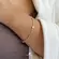 Pulseira Cravejada Ponto de Luz Coração Folheada a Ouro 18k