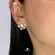Brinco Flor Com Zircônias Folheado a Ouro 18k