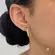 Brinco Gancho Zircônia Folheado a Ouro 18k
