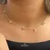 Gargantilha Mix Marinho Zircônias Coloridas Folheada a Ouro 18k