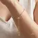 Pulseira Regulável Cruz Zircônia Folheada a Ouro 18k